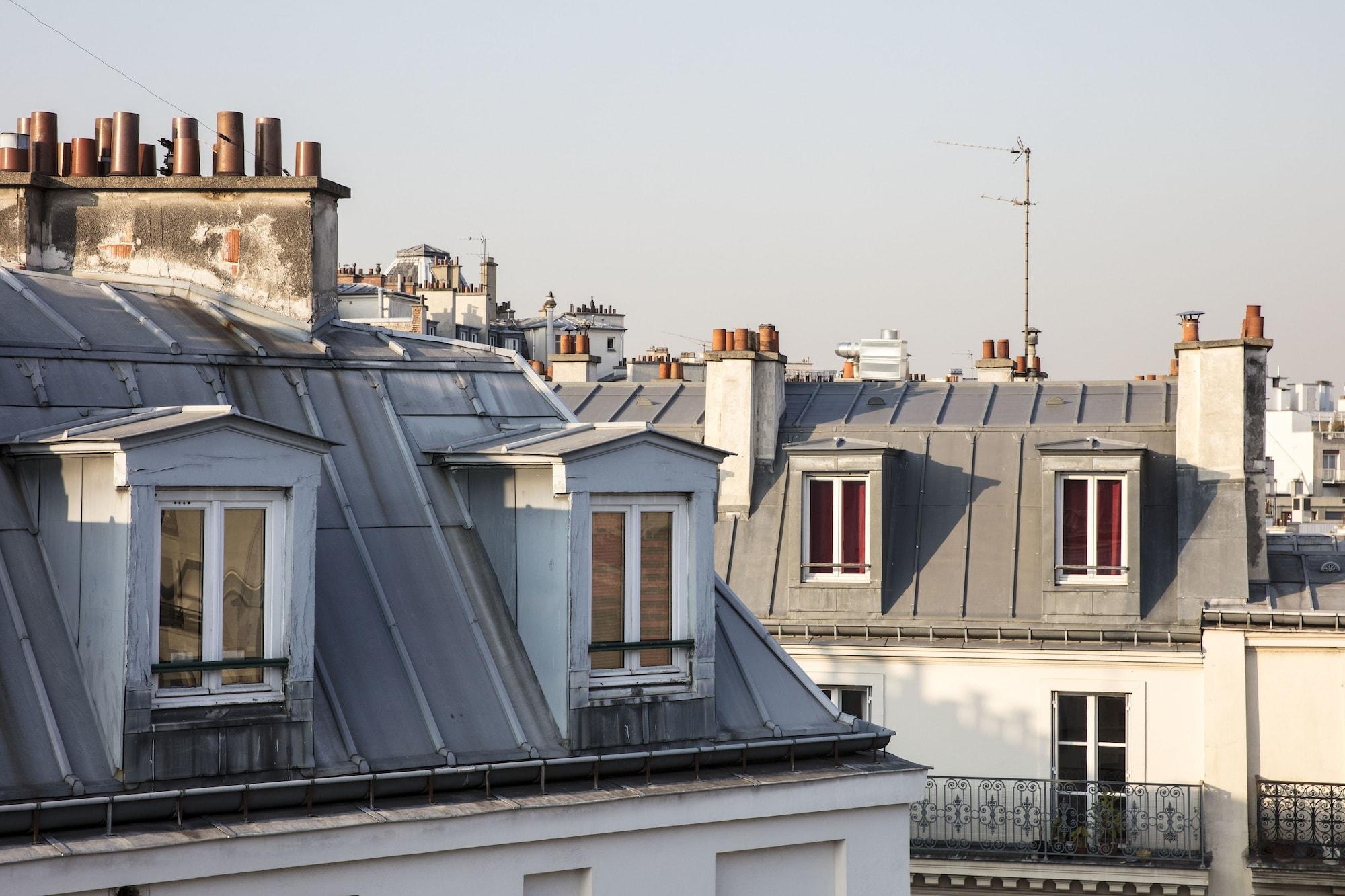 فندق ميزون بريغيت باريس المظهر الخارجي الصورة The roofs of Paris