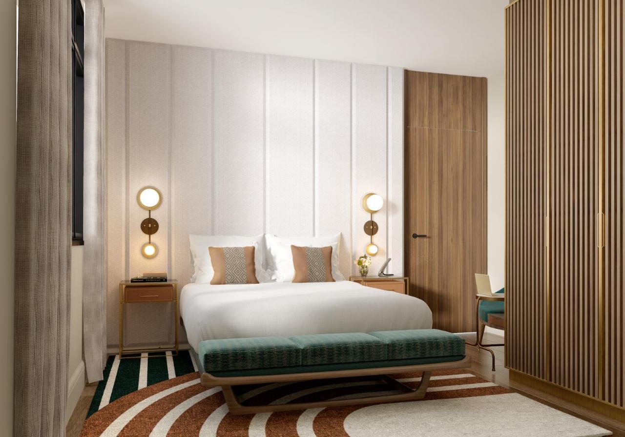 فندق ميزون بريغيت باريس المظهر الخارجي الصورة A bedroom at the hotel